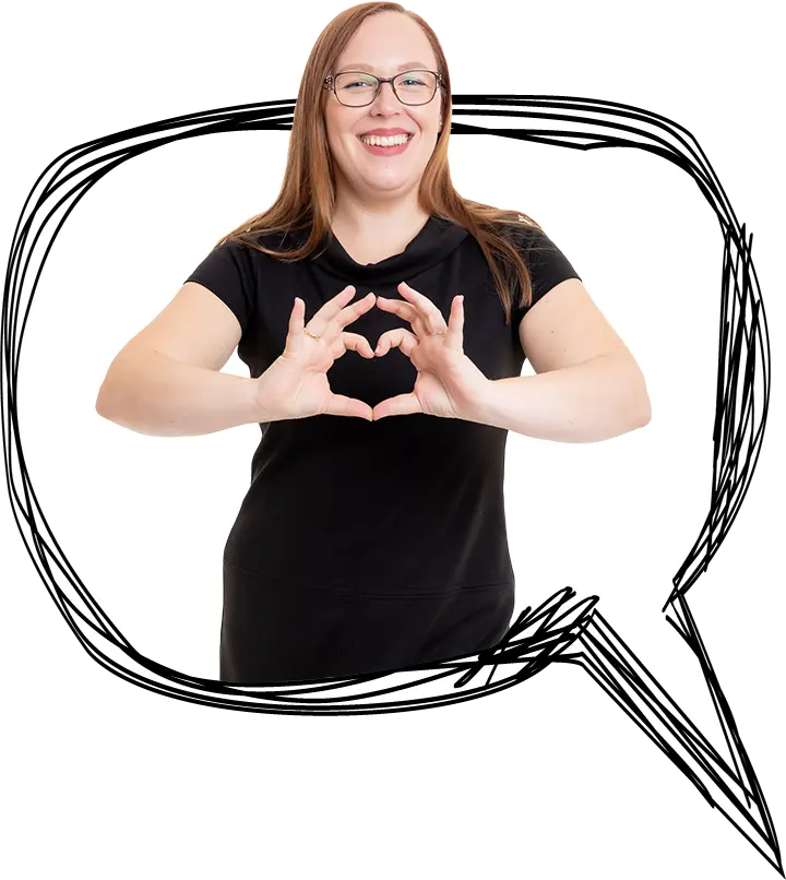 Melanie kommt aus einer Sprechblase heraus formt mit ihren Händen ein Herz - EINSigartige Webdesigner und Grafiker